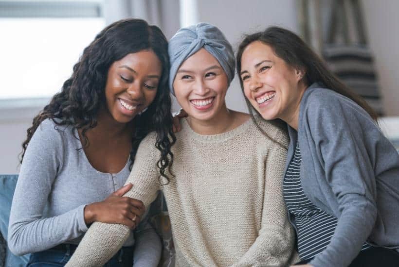 3 women comforting one another the lady in the center has cancer featured image for 3 Powerful Ways For You To Remember Gods Got This