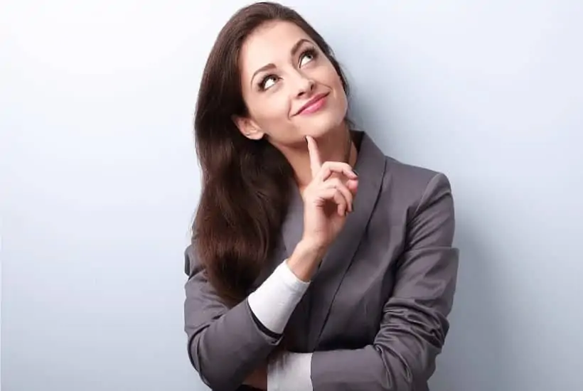 an image of a woman putting her finger on her chin looking upward